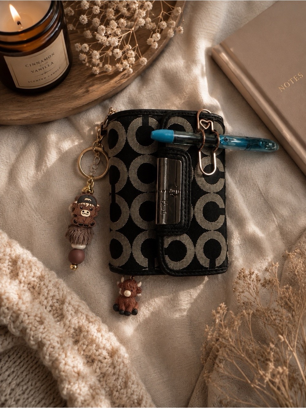 Coach Black Signature Circle Compact Wallet with Blue Pen Charm